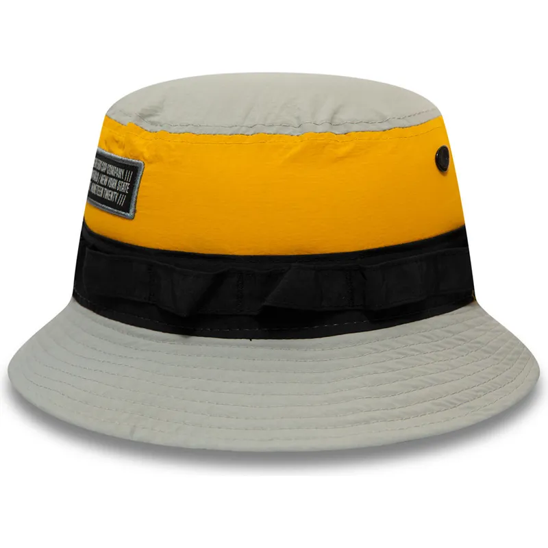 eimer-grau-der-bucket-gris-negro-y-amarillo-panelled-adventure-von-new-era