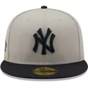 casquette-plate-grise-et-bleue-marine-ajustee-59fifty-side-patch-new-york-yankees-mlb-new-era