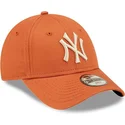 new-era-curved-brim-youth-9forty-league-essential-new-york-yankees-mlb-orange-adjustable-cap-with-beige-logo