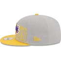 mutzen-flach-grau-snapback-9fifty-draft-edition-2023-der-los-angeles-lakers-nba-von-new-era