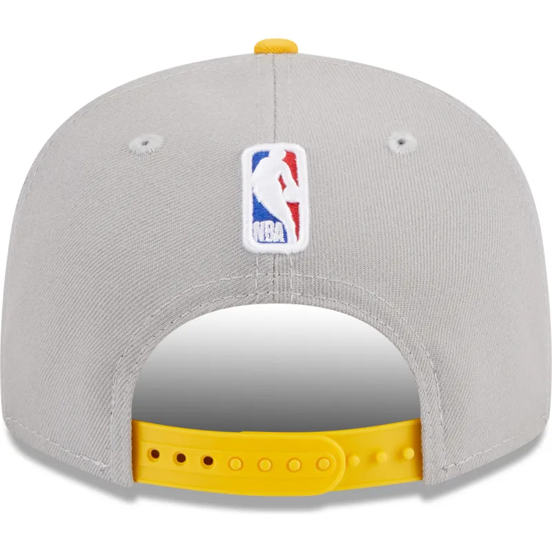 mutzen-flach-grau-snapback-9fifty-draft-edition-2023-der-los-angeles-lakers-nba-von-new-era