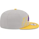 mutzen-flach-grau-snapback-9fifty-draft-edition-2023-der-los-angeles-lakers-nba-von-new-era