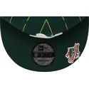 grune-flache-snapback-kappe-9fifty-pinstripe-visor-clip-der-oakland-athletics-mlb-von-new-era