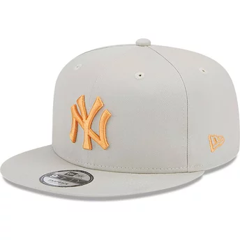 Casquette plate beige snapback avec logo orange 9FIFTY Side Patch New York Yankees MLB New Era
