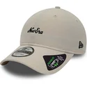 beige-verstellbare-curved-cap-9twenty-repreve-heritage-script-von-new-era