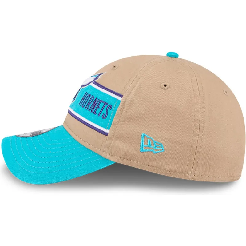 braune-und-blaue-verstellbare-curved-cap-9twenty-draft-2024-der-charlotte-hornets-nba-von-new-era braune-und-blaue-verstellbare-curved-cap-9twenty-draft-2024-der-charlotte-hornets-nba-von-new-era