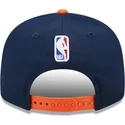 marineblaue-und-orangefarbene-flache-snapback-kappe-9fifty-statement-der-new-york-knicks-nba-von-new-era