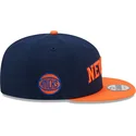 marineblaue-und-orangefarbene-flache-snapback-kappe-9fifty-statement-der-new-york-knicks-nba-von-new-era