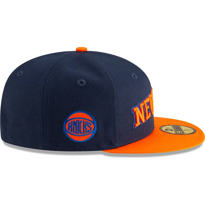 marineblaue-und-orangefarbene-anliegende-flat-cap-59fifty-statement-der-new-york-knicks-nba-von-new-era
