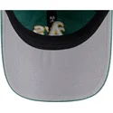 grune-verstellbare-curved-cap-9twenty-washed-contrast-der-oakland-athletics-mlb-von-new-era