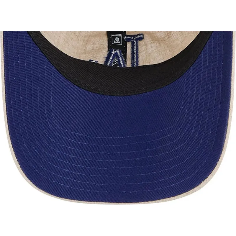 beige-verstellbare-curved-cap-mit-blauem-logo-9twenty-linen-spring-training-fan-pack-2025-der-los-angeles-dodgers-mlb-von-new-er beige-verstellbare-curved-cap-mit-blauem-logo-9twenty-linen-spring-training-fan-pack-2025-der-los-angeles-dodgers-mlb-von-new-er