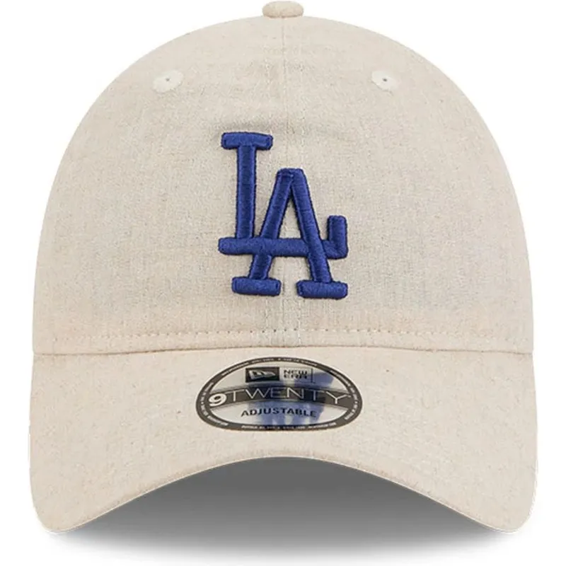 beige-verstellbare-curved-cap-mit-blauem-logo-9twenty-linen-spring-training-fan-pack-2025-der-los-angeles-dodgers-mlb-von-new-er beige-verstellbare-curved-cap-mit-blauem-logo-9twenty-linen-spring-training-fan-pack-2025-der-los-angeles-dodgers-mlb-von-new-er