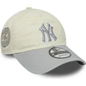 casquette-courbee-beige-et-grise-ajustable-pour-femme-9twenty-world-series-cooperstown-new-york-yankees-mlb-new-era