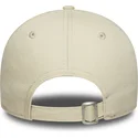 beige-verstellbare-curved-cap-fur-damen-9twenty-phrase-mi-media-naranja-von-new-era