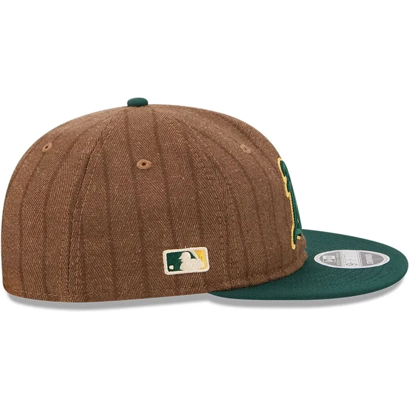 braune-und-grune-verstellbare-flatcap-9fifty-retro-crown-wool-pinstripe-der-oakland-athletics-mlb-von-new-era braune-und-grune-verstellbare-flatcap-9fifty-retro-crown-wool-pinstripe-der-oakland-athletics-mlb-von-new-era