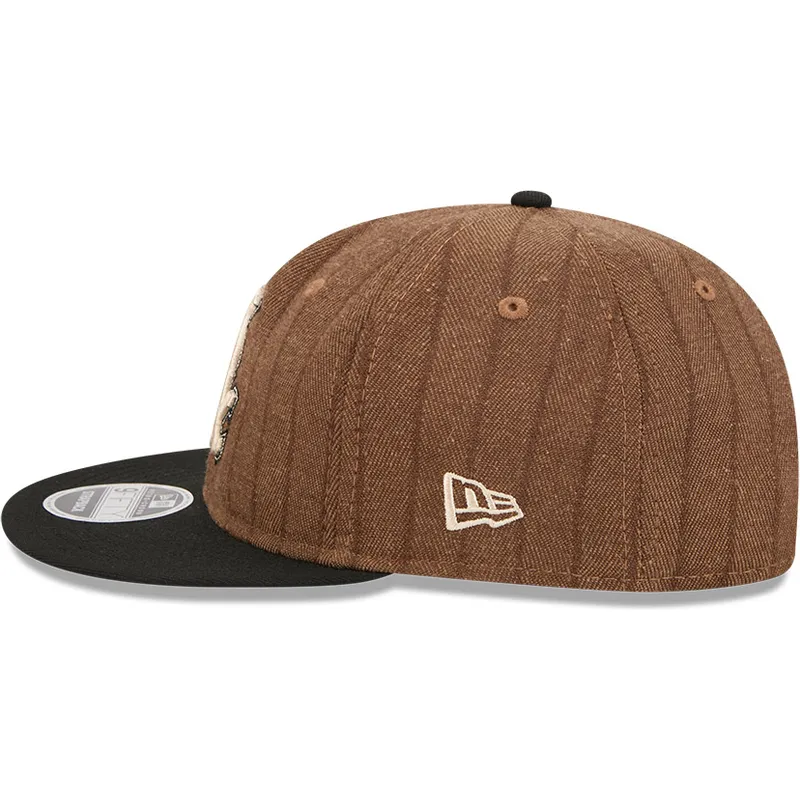 braune-und-schwarze-verstellbare-flatcap-9fifty-retro-crown-wool-pinstripe-der-chicago-white-sox-mlb-von-new-era braune-und-schwarze-verstellbare-flatcap-9fifty-retro-crown-wool-pinstripe-der-chicago-white-sox-mlb-von-new-era