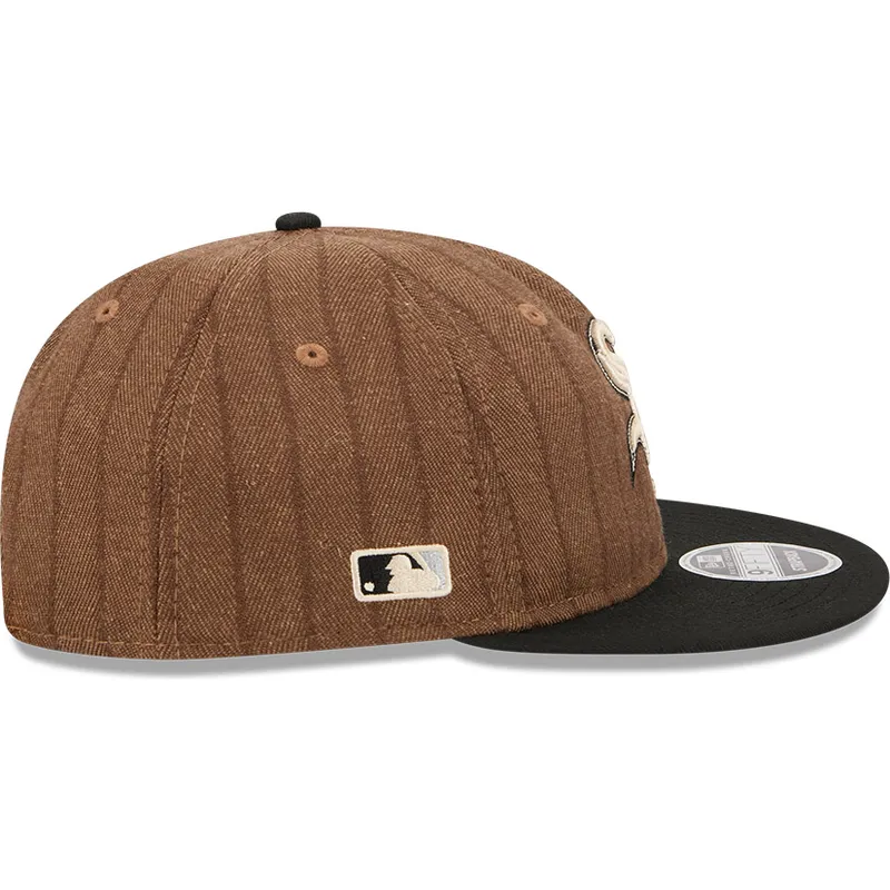 braune-und-schwarze-verstellbare-flatcap-9fifty-retro-crown-wool-pinstripe-der-chicago-white-sox-mlb-von-new-era braune-und-schwarze-verstellbare-flatcap-9fifty-retro-crown-wool-pinstripe-der-chicago-white-sox-mlb-von-new-era