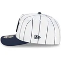 weisse-und-marineblaue-gebogene-snapback-kappe-9fifty-a-frame-satin-pinstripe-der-new-york-yankees-mlb-von-new-era
