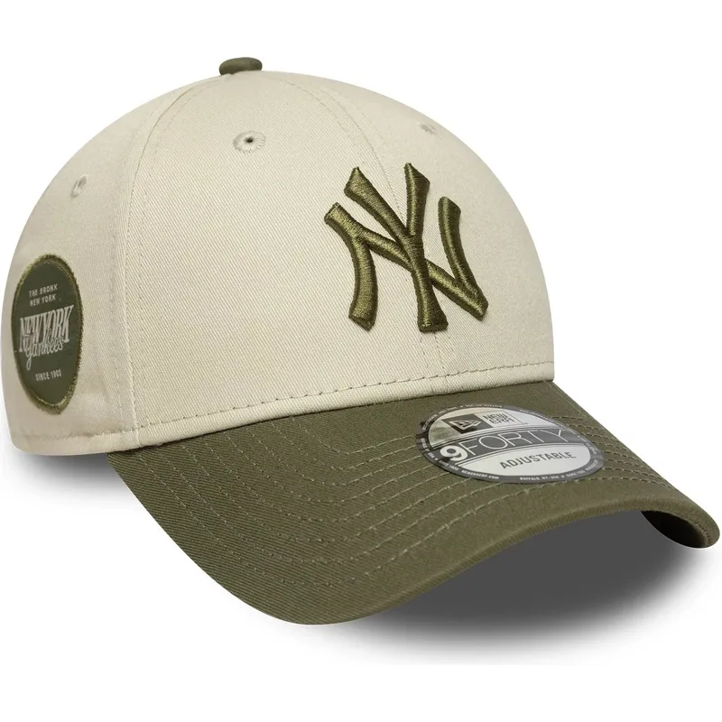 beige-und-grune-verstellbare-curved-cap-9forty-side-patch-der-new-york-yankees-mlb-von-new-era beige-und-grune-verstellbare-curved-cap-9forty-side-patch-der-new-york-yankees-mlb-von-new-era