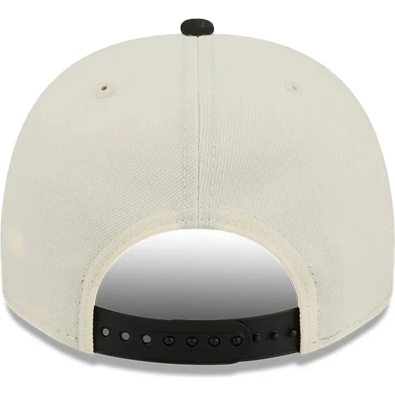 beige-und-schwarze-gebogene-snapback-kappe-9fifty-a-frame-precurved-hardwood-classics-der-detroit-pistons-nba-von-new-era