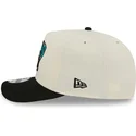 casquette-courbee-beige-et-noire-snapback-9fifty-a-frame-precurved-hardwood-classics-vancouver-grizzlies-nba-new-era