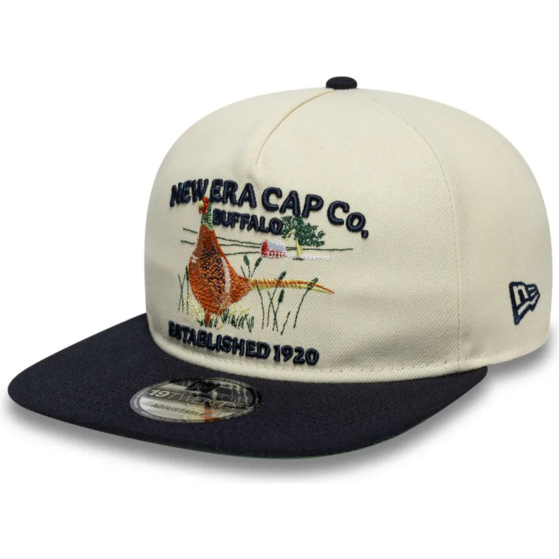 flache-beige-und-marineblaue-verstellbare-kappe-19twenty-outdoor-graphic-von-new-era flache-beige-und-marineblaue-verstellbare-kappe-19twenty-outdoor-graphic-von-new-era