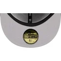 schwarze-enganliegende-59fifty-all-over-flat-cap-von-milb-von-new-era