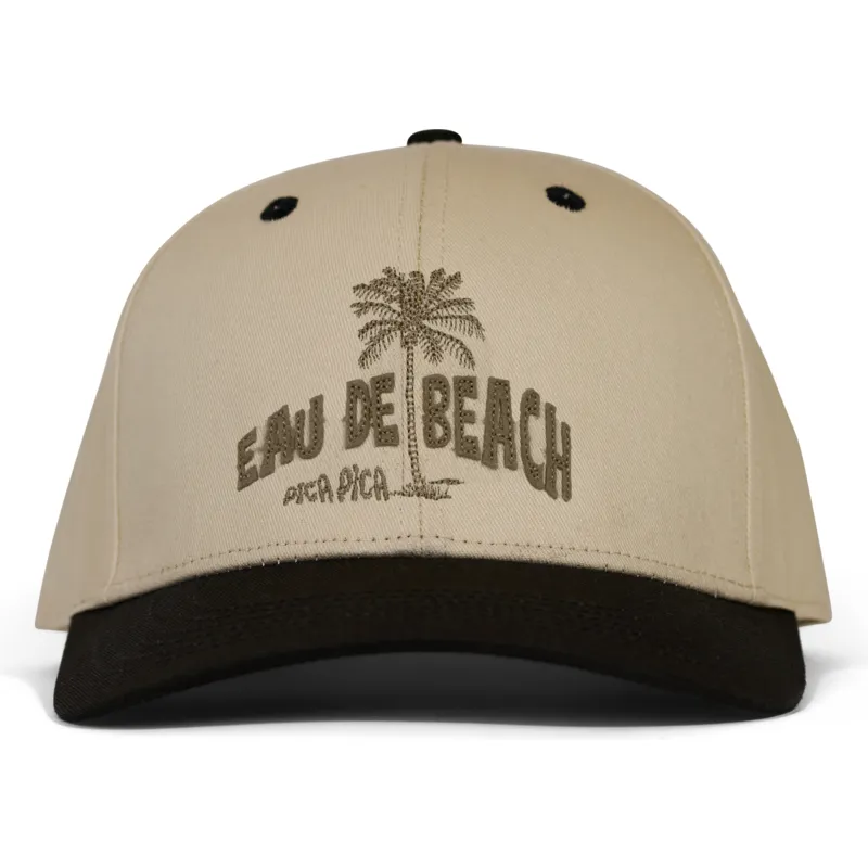 beige-und-schwarze-gebogene-snapback-kappe-eau-de-beach-von-pica-pica beige-und-schwarze-gebogene-snapback-kappe-eau-de-beach-von-pica-pica